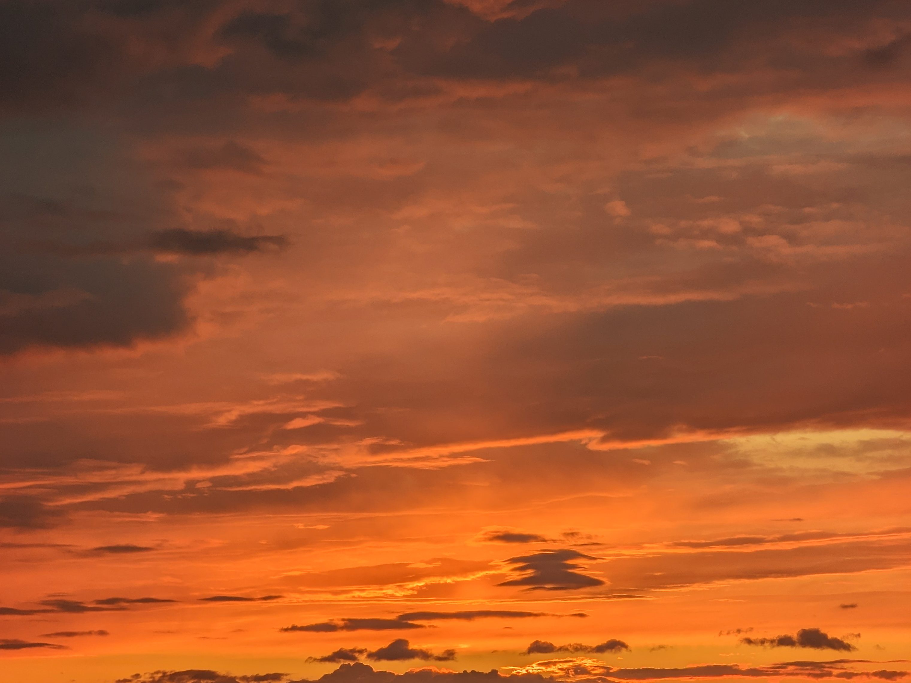 The sky's orange glow after the midnight sunset in Reykjavik, Iceland