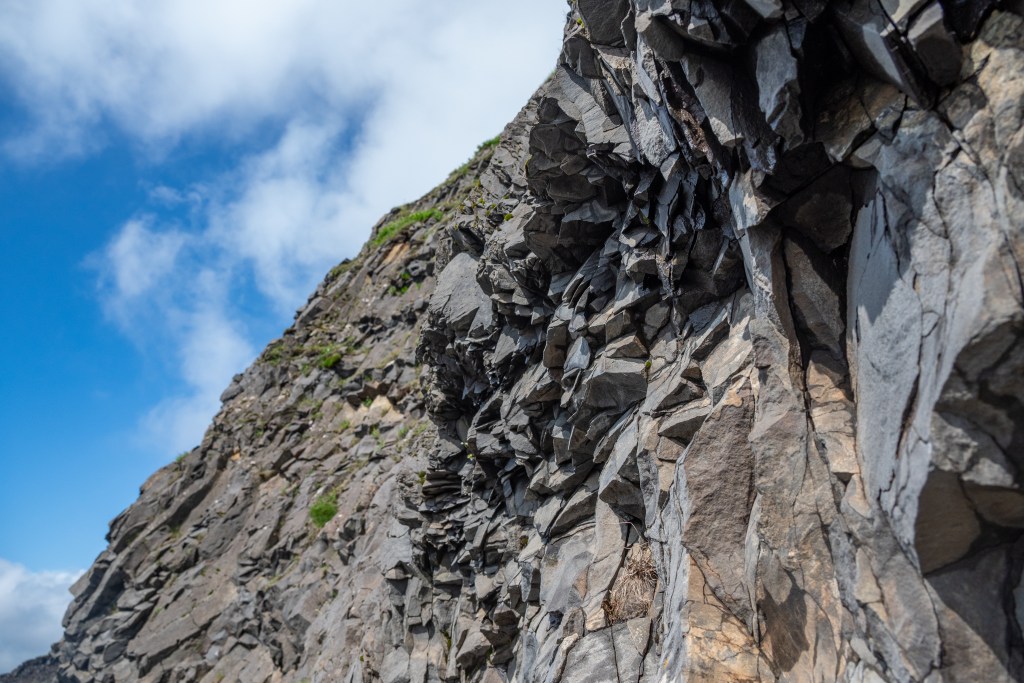 Rock formations at Reynisfjara black sand beach in Iceland