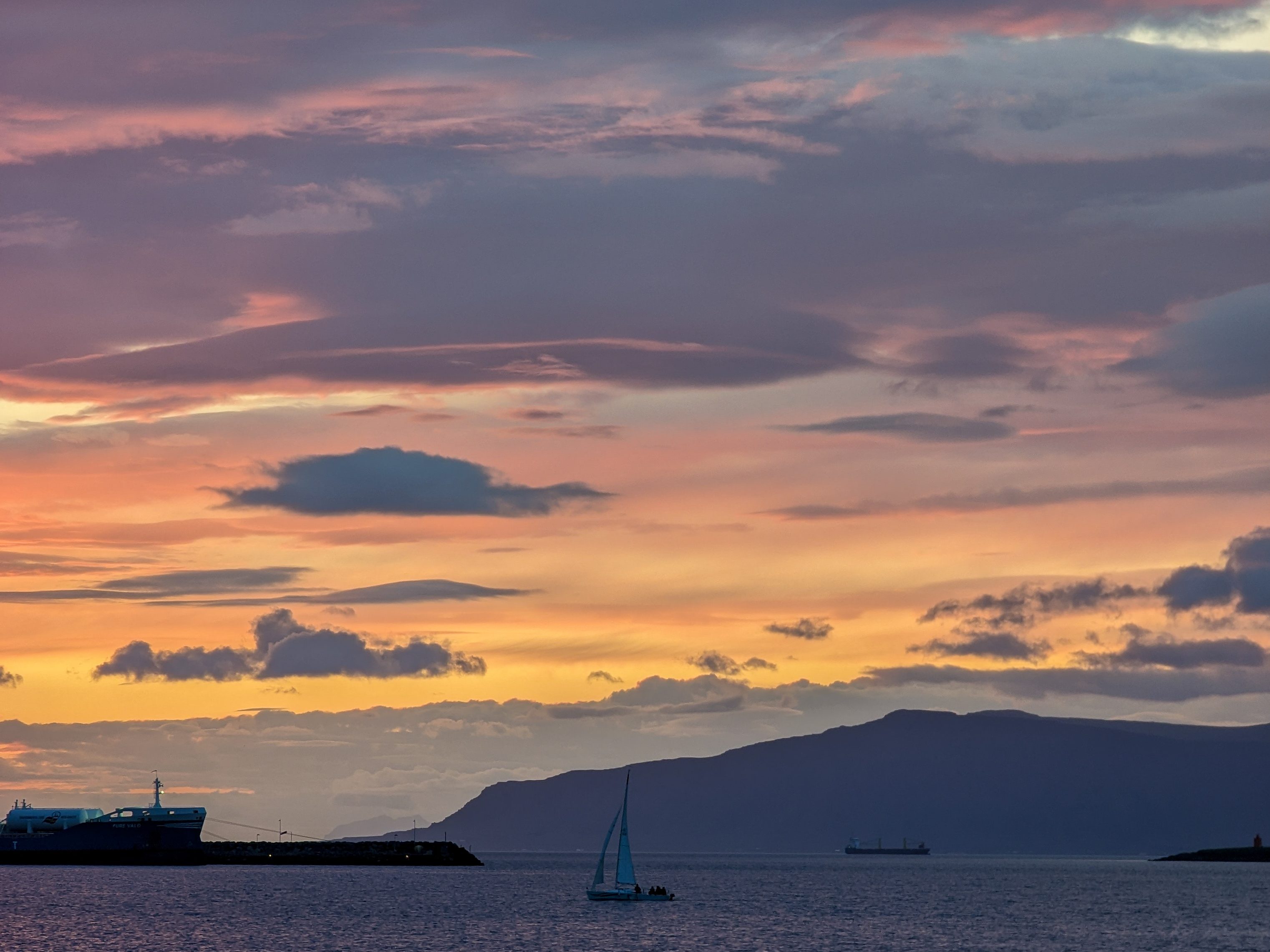 The sky's orange glow after the midnight sunset in Reykjavik, Iceland