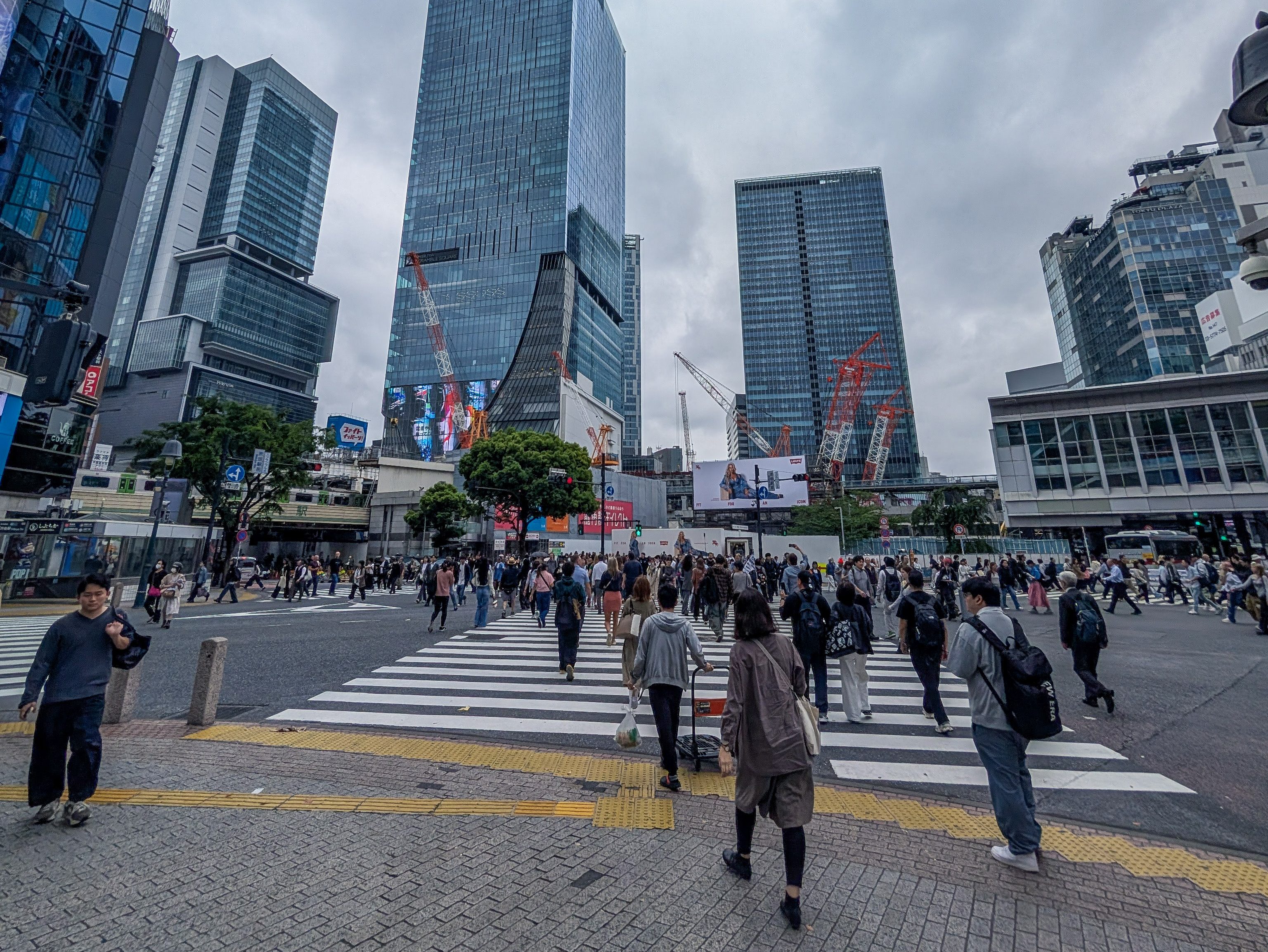 Shibuya Scramble Crossing in the afternoon on a cloudy day.